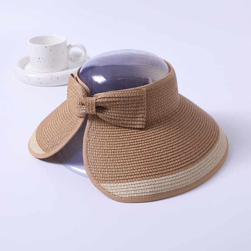 Sombrero de paja transparente superior primavera y verano nueva decoración de lazo sombrero de playa tejido versión coreana femenina del sombrero de copa vacío sombrilla al aire libre sombrero de protección solar