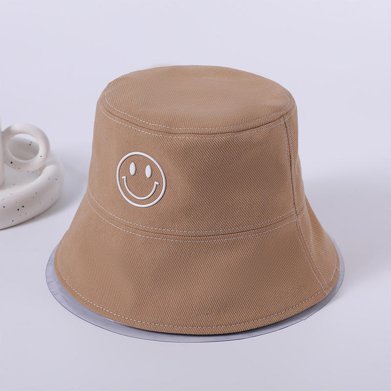 Sombrero de tela primavera y verano nuevo patrón de cara sonriente sombrero de playa tejido versión coreana femenina del sombrero de pescador sombrilla al aire libre sombrero protector solar