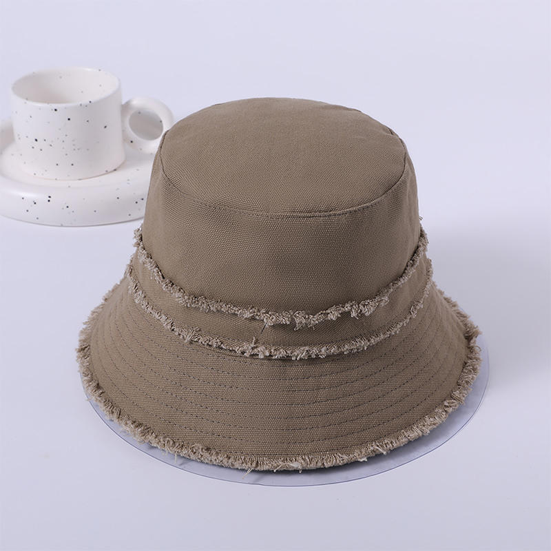 Sombrero de tela de borde crudo primavera y verano nuevo juego de ocio sombrero de playa versión coreana femenina del sombrero de pescador sombrilla al aire libre sombrero protector solar