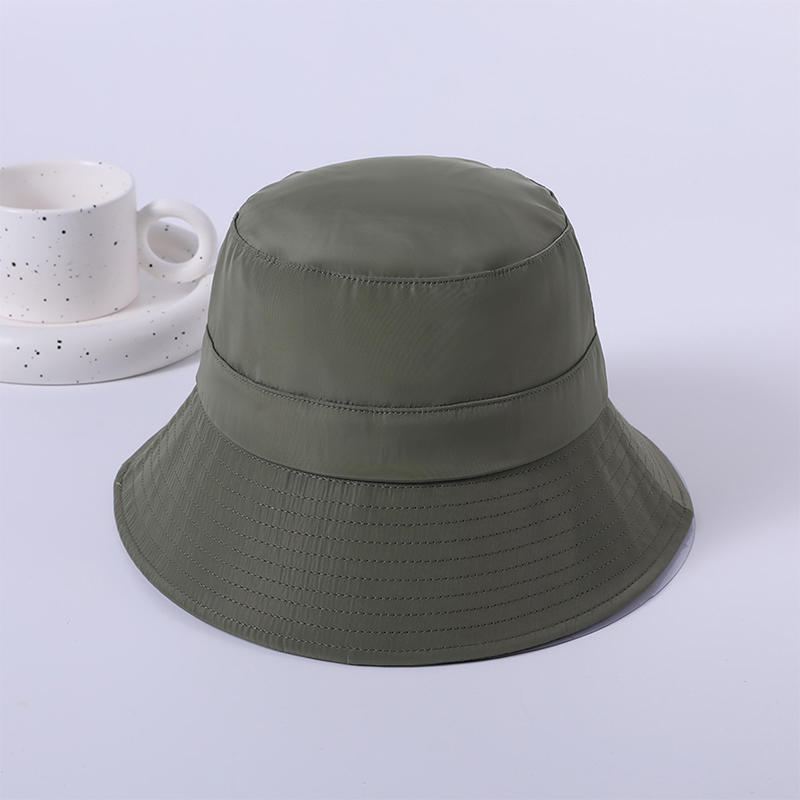 Sombrero de tela verde primavera y verano nuevo juego de ocio sombrero de playa versión coreana femenina del sombrero de pescador sombrilla al aire libre sombrero protector solar