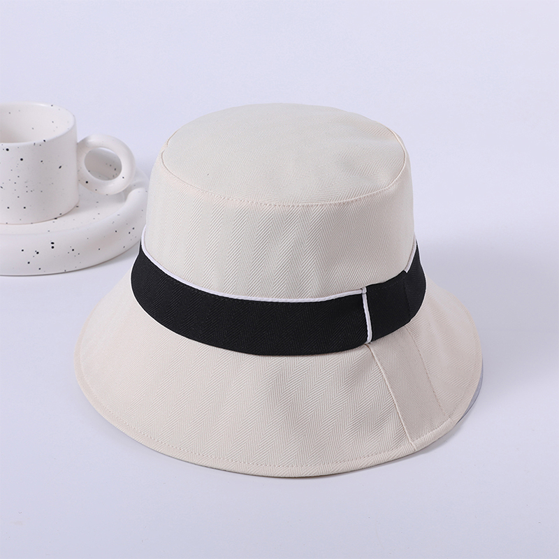 Sombrero de tela blanca primavera y verano nuevo sombrero de playa casual simple versión coreana femenina del sombrero de pescador sombrilla al aire libre sombrero protector solar