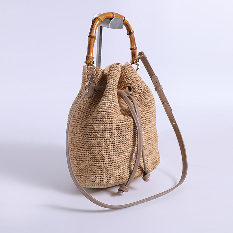 Bolso de mano de bambú de cuero de viento de puesto de mar con gancho de mano de rafia importado compuesto por bolso de ganchillo fino tejido