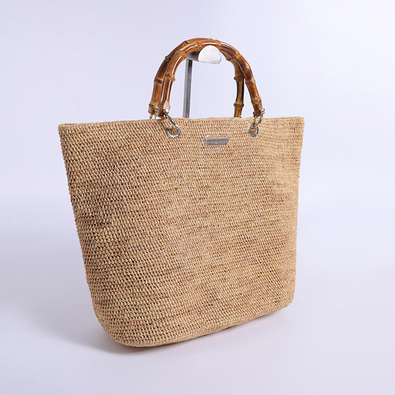 Bolso de mano de bambú de cuero de viento de puesto de mar con gancho de mano de rafia importado compuesto por bolso de mano de ganchillo fino tejido