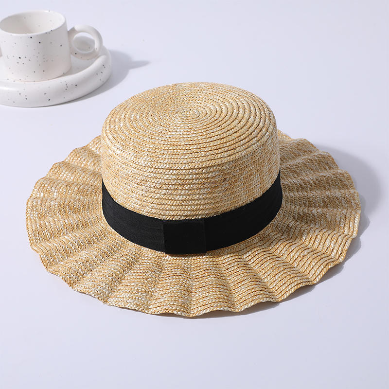 Sombrero de paja con volantes primavera y verano nuevo juego de ocio sombrero de playa tejido versión coreana femenina del sombrero para el sol sombrilla al aire libre sombrero para el sol