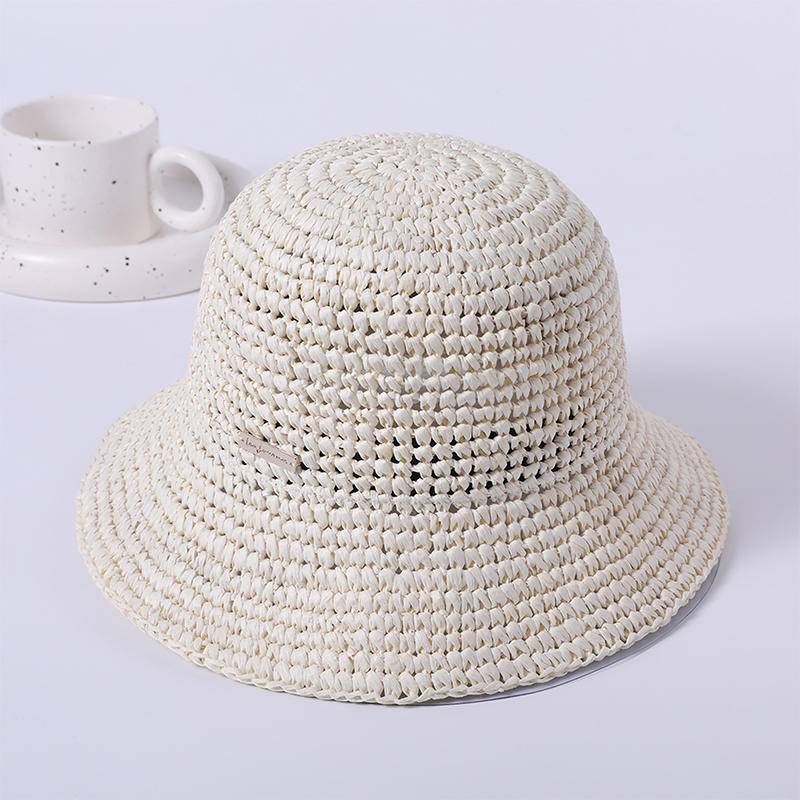 Sombrero de paja blanco primavera y verano nuevo juego de ocio sombrero de playa de punto versión coreana femenina del sombrero de pescador sombrilla al aire libre sombrero protector solar