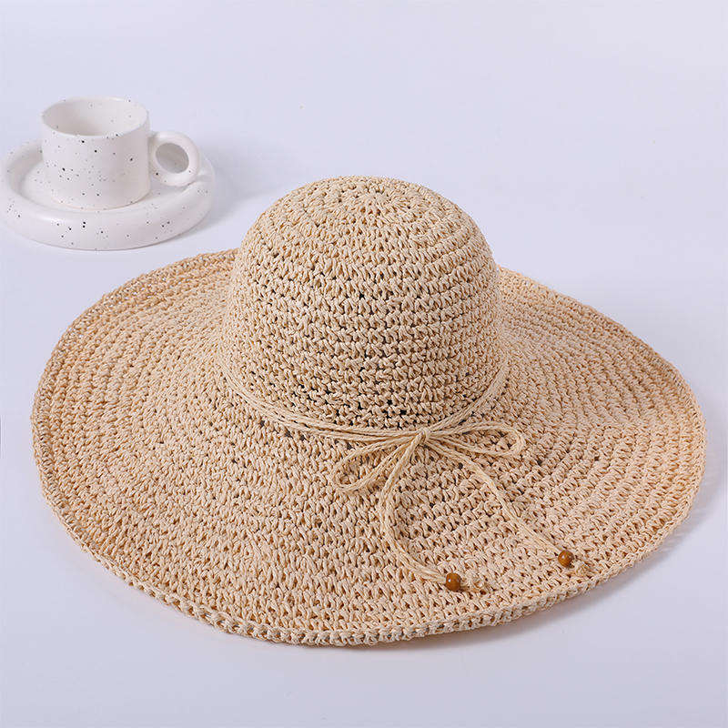 Sombrero de paja liso simple primavera y verano nuevo juego de ocio sombrero de playa de punto versión coreana femenina del sombrero para el sol sombrilla al aire libre sombrero para el sol