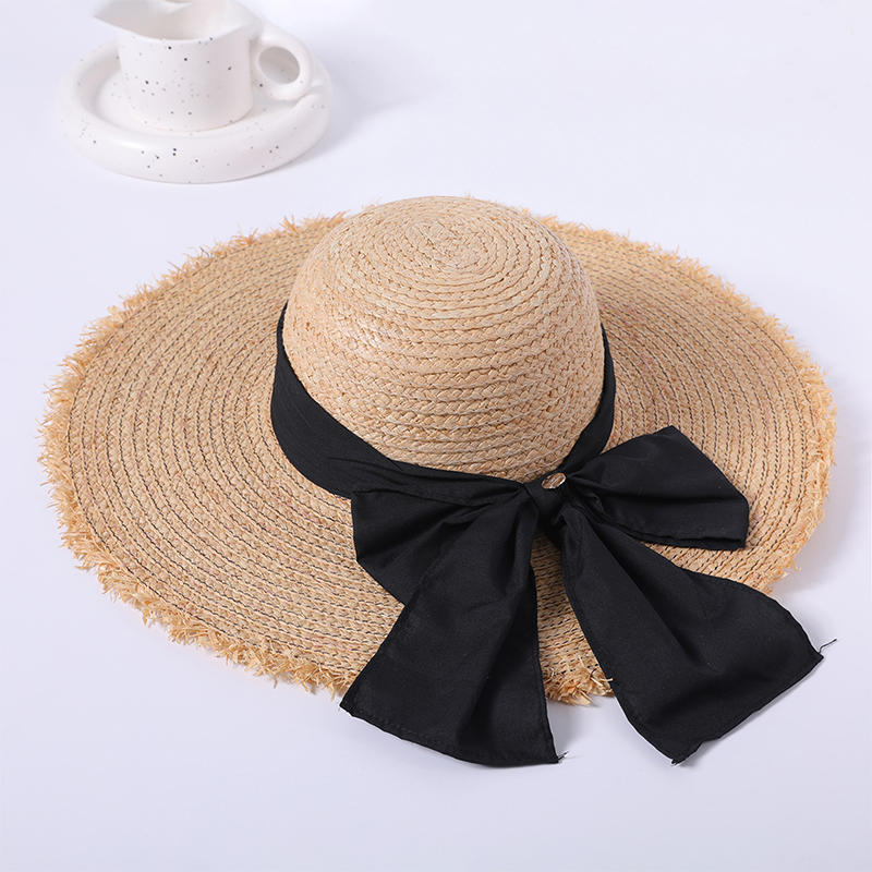 Sombrero de paja con lazo negro primavera y verano nuevo juego de ocio sombrero de playa de punto versión coreana femenina del sombrero para el sol sombrilla al aire libre sombrero para el sol