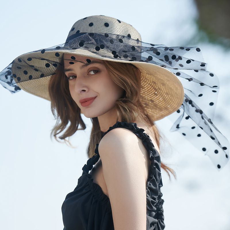 Punto de onda sombrero de paja de encaje primavera y verano nuevo juego de ocio sombrero de playa tejido versión coreana femenina del sombrero para el sol sombrilla al aire libre sombrero para el sol